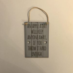 An apple a day keeps anything away if you throw it hard enough wooden sign