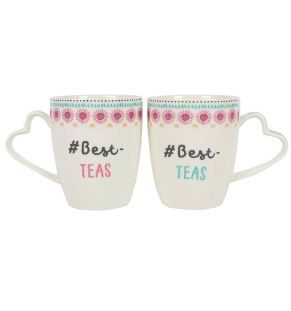 Pair of pastel mugs with heart handles