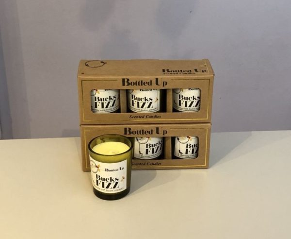 Set of 3 recycled glass votive candles with a festive bucks fizz scent
