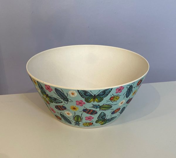 bamboo salad bowl with a butterfly and beetle design in pastel colours