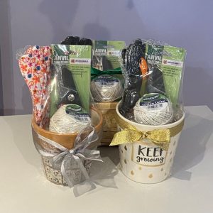Gardening gift baskets. Each plant pot is filled with gardening gloves, secateurs and a ball of string