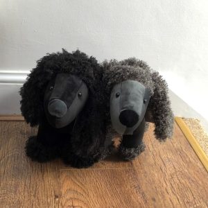 Fluffy standing poodle doorstops