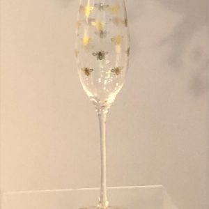 champagne or prosecco flute with gold bees decoration