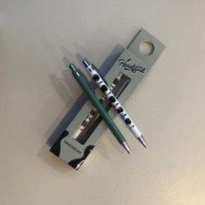 Two ball point pens with guitar decorations