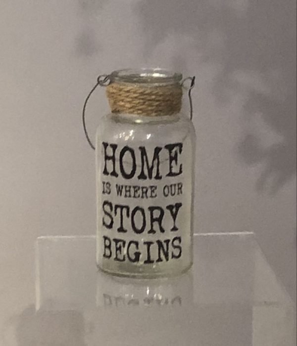 home is where are story begins glass lantern