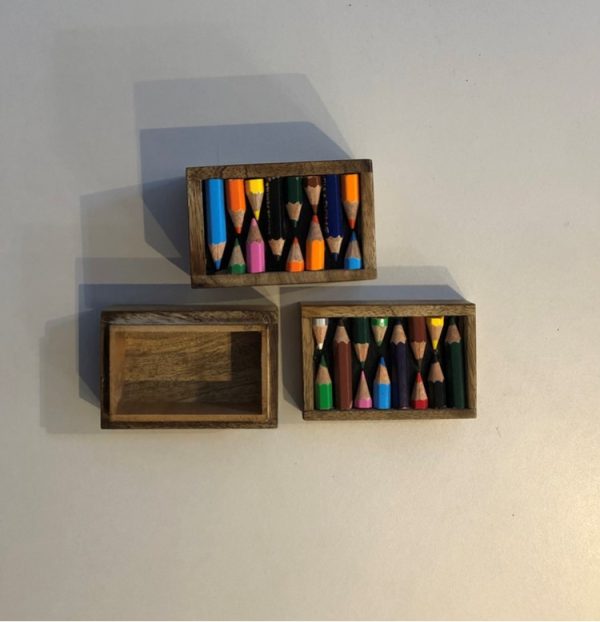 Medium rectangular wooden box decorated with recycled pencils