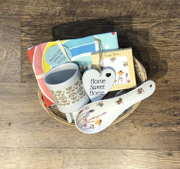 New home gift basket- planter, tea towel, spoon rest and coaster