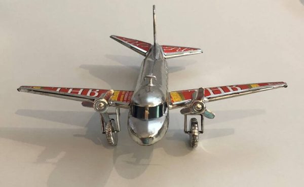 aeroplane hand made from recycled tin cans