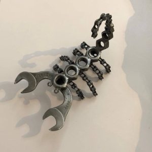 scorpion ornament sculpted from recycled tools, nuts and bike chains