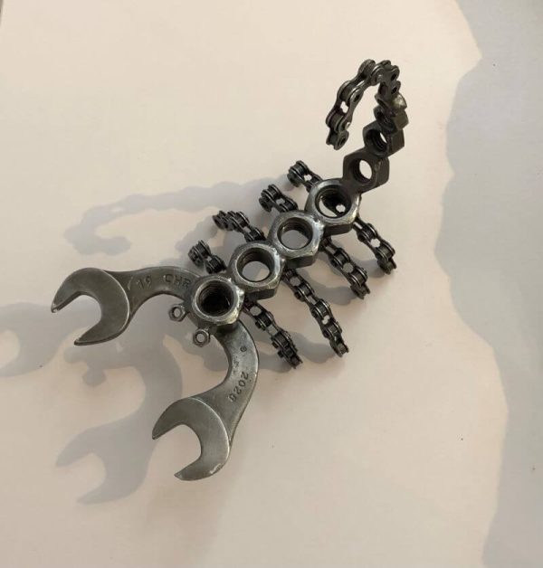 scorpion ornament sculpted from recycled tools, nuts and bike chains