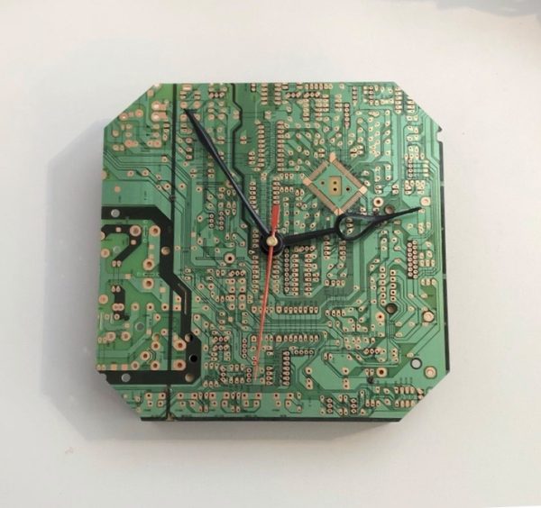 quirky wall clock made from a recycled computer circuit board