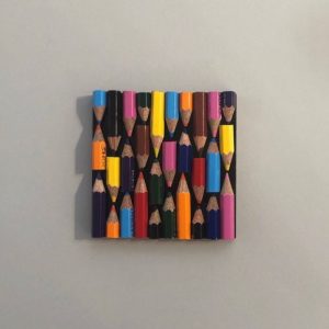 Drink coaster made with recycled pencils