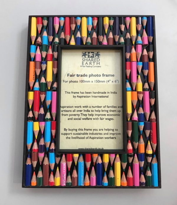 wooden photo frame decorated with coloured pencil crayon stubs