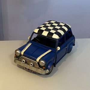 detailed metal model of a classic mini car with a blue and white checkerboard roof