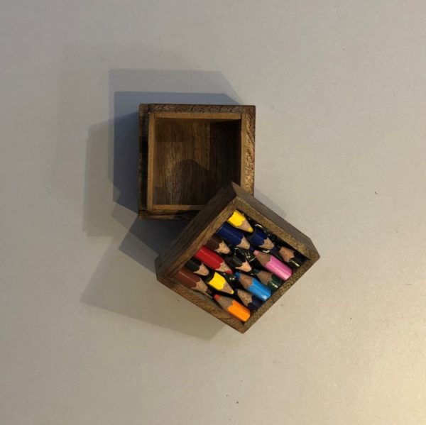 Small square wooden box decorated with recycled pencils. Perfect for earrings