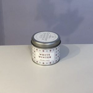 White winter festive soy wax scented candle in a tin from The Country Candle Company