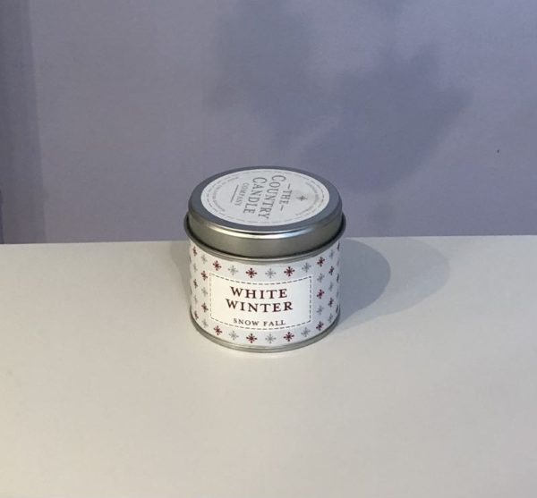 White winter festive soy wax scented candle in a tin from The Country Candle Company
