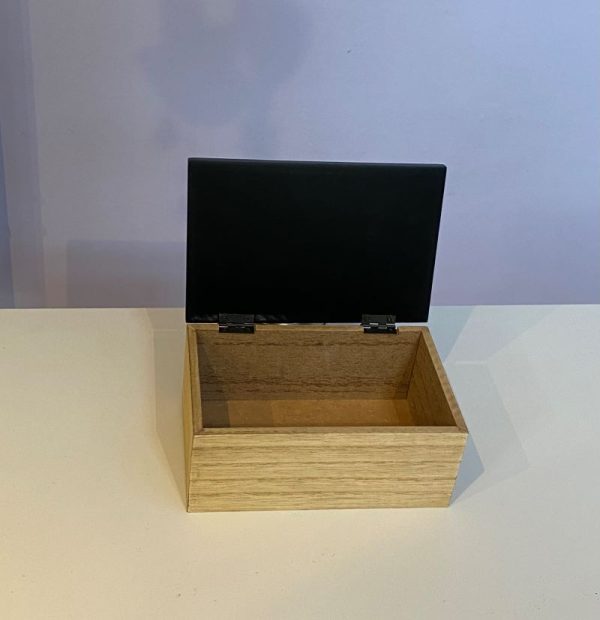 Natural wood veneer storage box with a hinged matt black lid and contrasting decorative carving  "Man Box" perfect for keeping loose change and all those pocket bits and bobs.