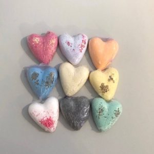 assortment of heart shaped hand made bath bombs