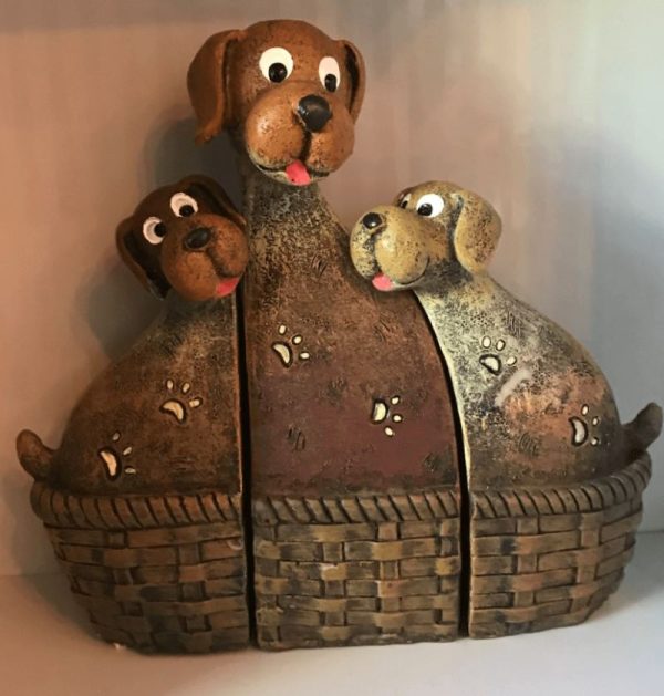 Dog family snuggled up in a basket ornament