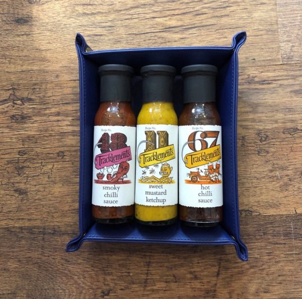 genlemans storage tray with 3 Tracklements artisan sauces