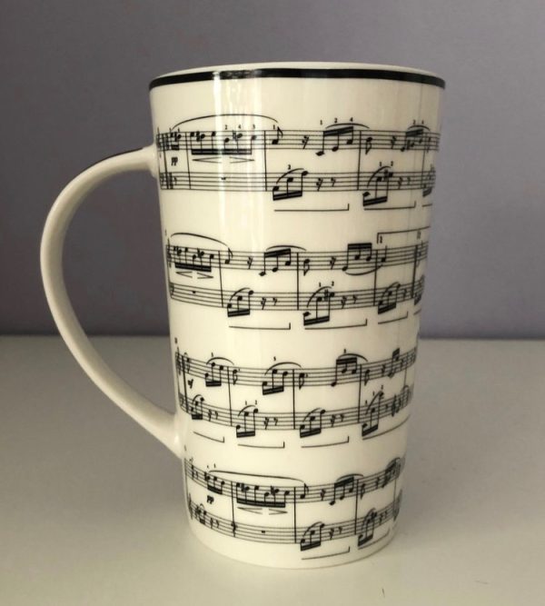 Latte coffee cup with a musical score design