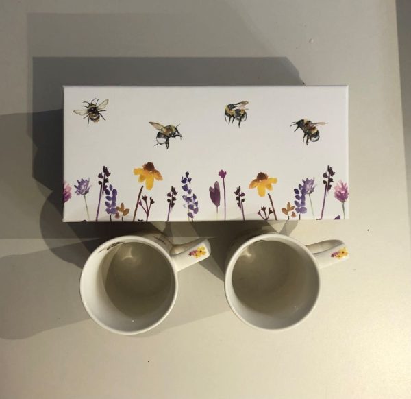 pair of fine chine mugs in a wild flower and bee design in a matching luxury gift box