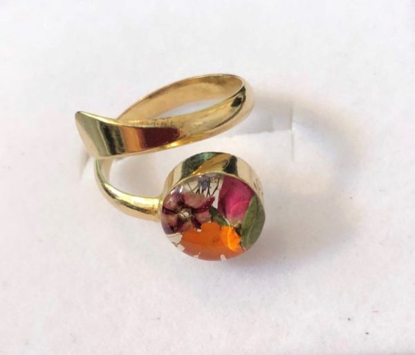 Gold plated adjustable ring with beautiful mixed flowers encased in resin