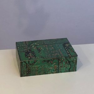 wooden storage box made with recycled computer circuit boards
