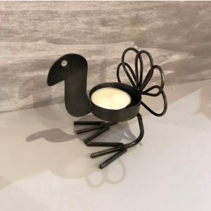 bird tea light candle holder made from recycled metal