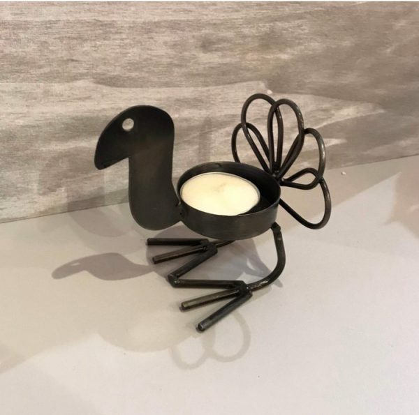 bird tea light candle holder made from recycled metal