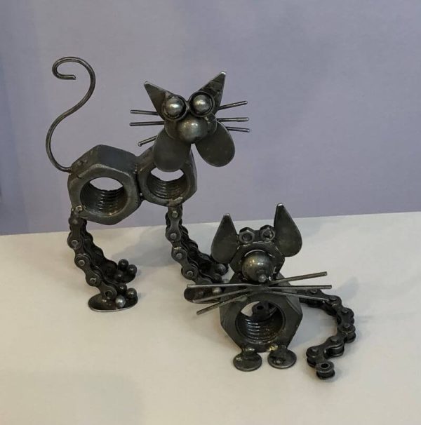 Cute cat and mouse sculpted from recycled scrap metals