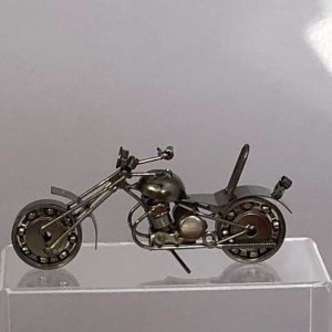 silver metal motorcycle mad from recycled nuts, bolts and scrap metal