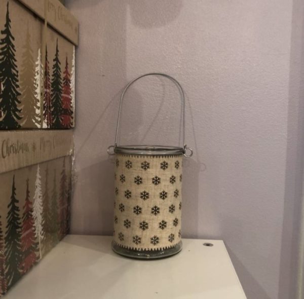 glass lantern with a craft snowflake decoration