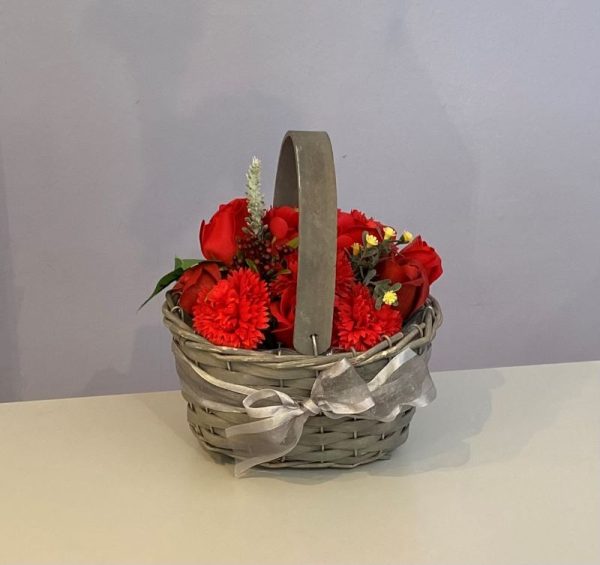 beautiful flowers hand crafted from soap in a grey trug wicker basket