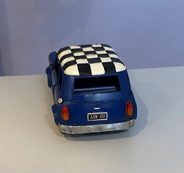 vintage look classic blue mini model car with checkered roof