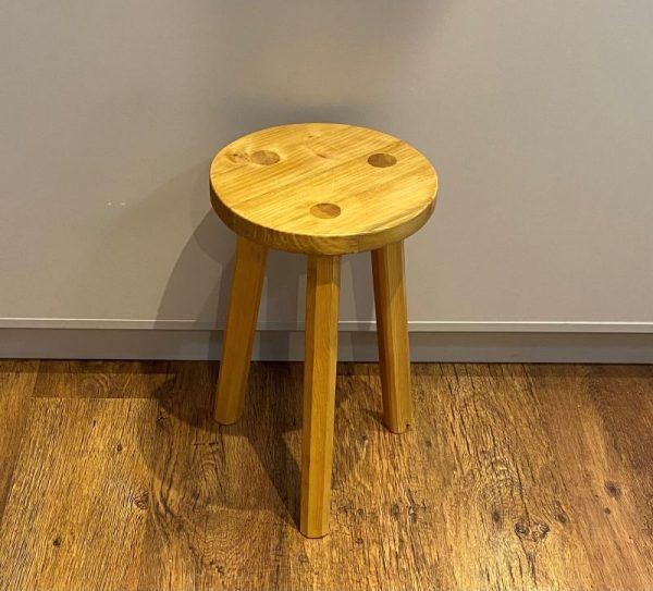 hand crafted traditional solid wood stool or side table with a light oak wood stain