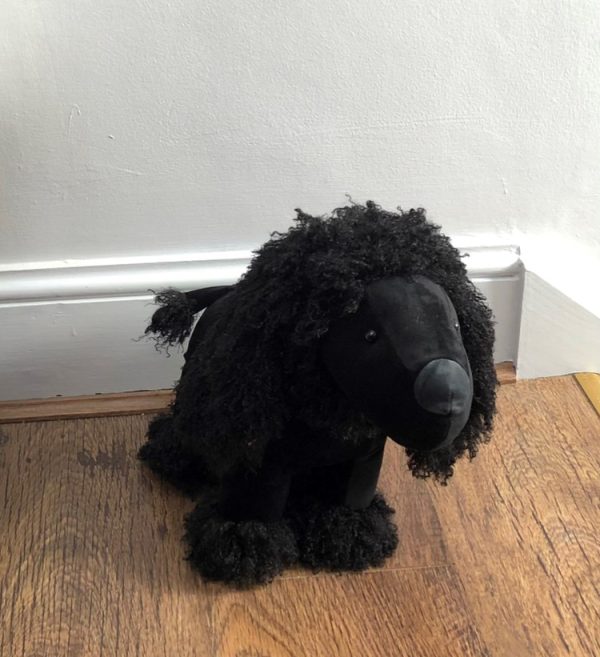 Black poodle doorstop