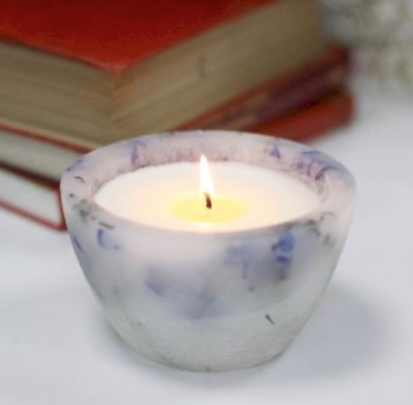 Lavender scented candle in a large wax bowl with real lavender flowersx