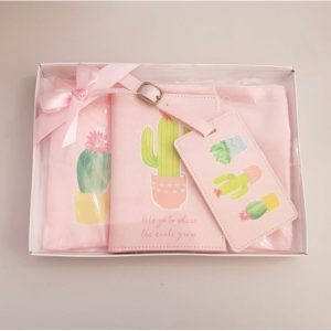 Cactus travel gift set including a passport holder, luggage tag and travel pouch.