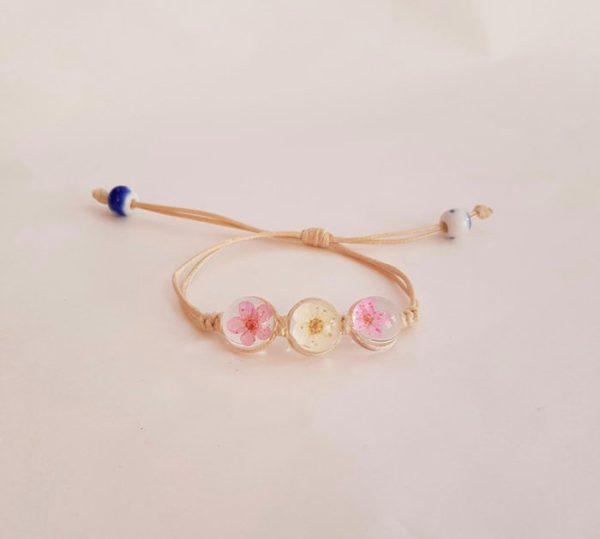 cord brace;let with pink and white flower charms