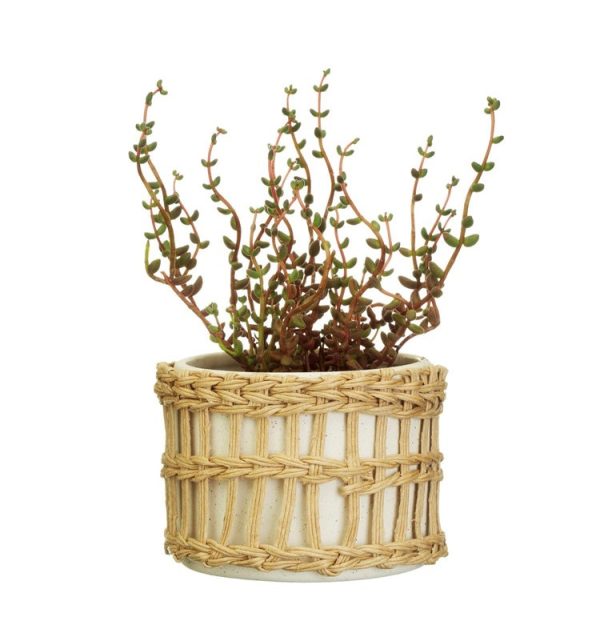 wicker and stoneware pot