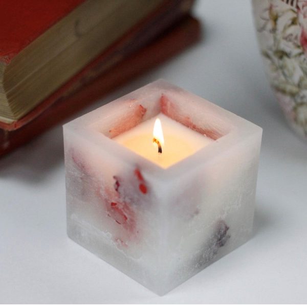 Rose soy wax scented candle in a square wax shell with real rose petals