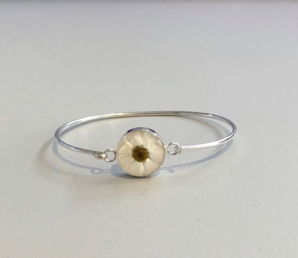 real flower jewellery white daist charm on a silver bangle