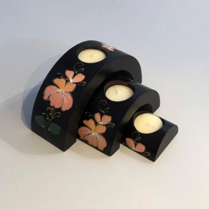 triple arch tea light holder hand acrved from mango wood and decorated with light pink flowers
