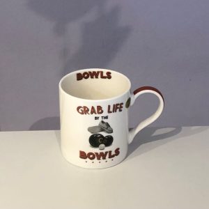 novelty gift mug with a bowling theme decoration and text saying grab life by the bowls