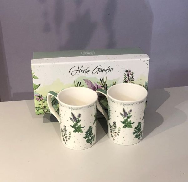Pair of matching fine china white mugs decorated with herbs in a matching luxury gift box