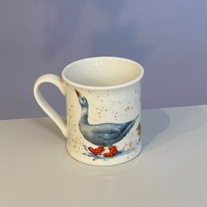 Classic white mug with a cute duck and ducklings in boots splashing in puddles