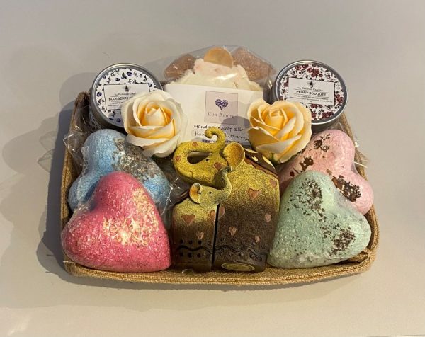 Jute gift basket with elephant ornament, bath bombs and scented candles