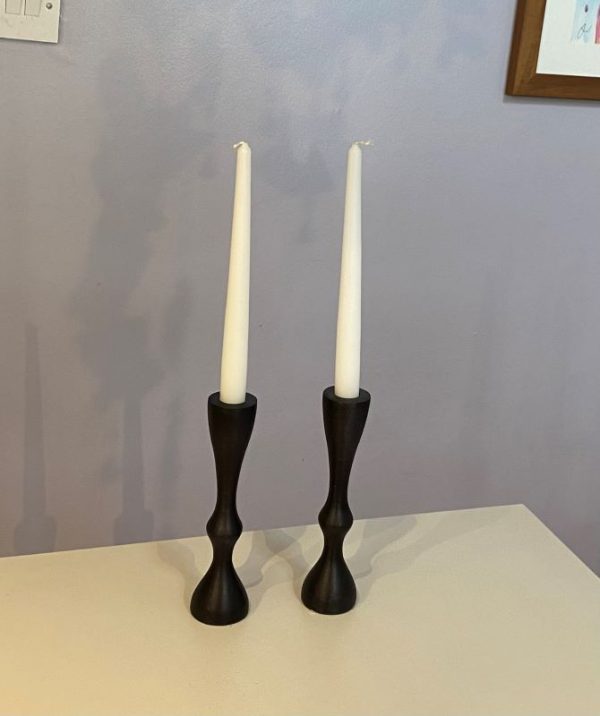 Timeless black candlesticks with an elegant classic silhouette cast from aluminium with a black matt finish. Nero by Edge Company